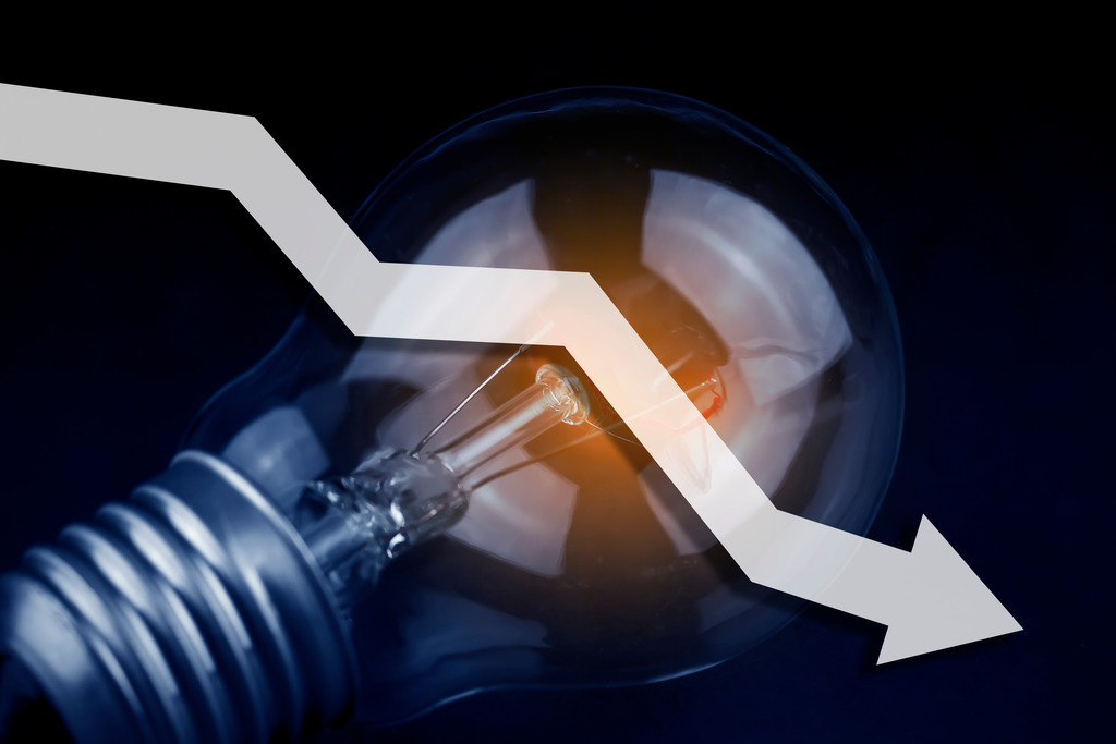 Lâmpada com gráfico para baixo sinalizando o consumo tusd